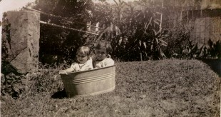 Dorothy and Don playing in the backyard of The Glen